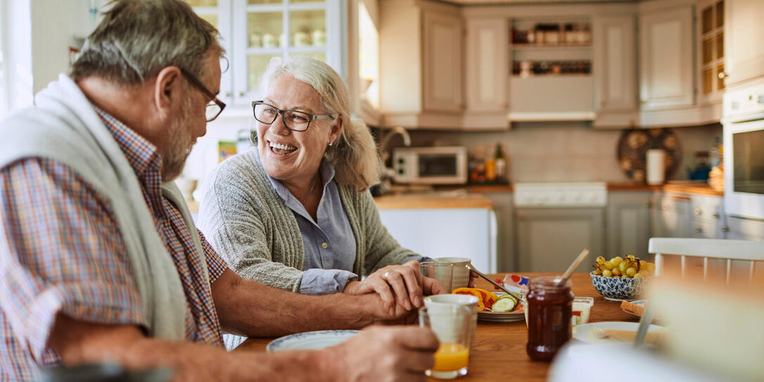 Senior couple having breakfast