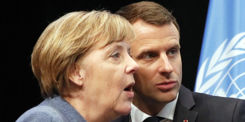 Bundeskanzlerin Angela Merkel und Frankreichs Präsident Emanuel Macron in Bonn während der Eröffnung des Ministerteils der Klimakonferenz.
