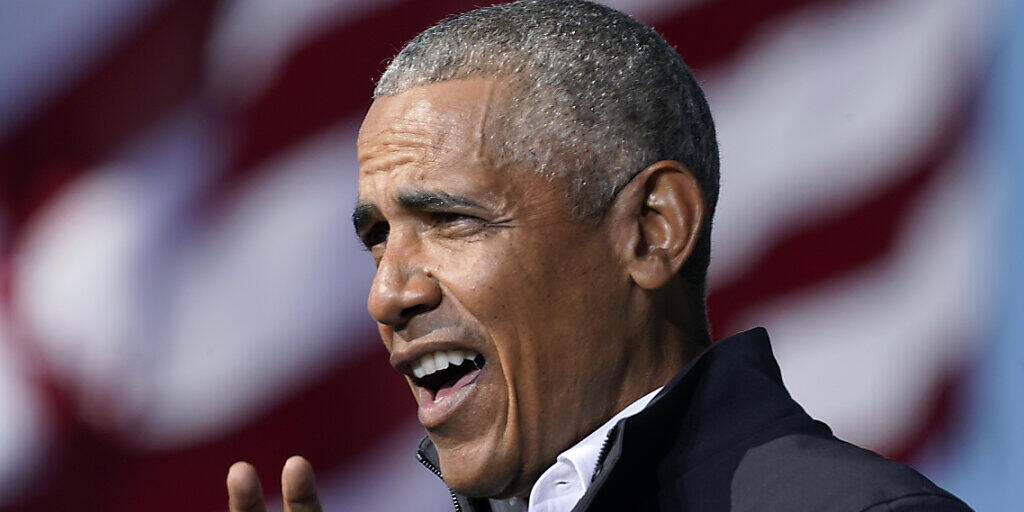 Barack Obama, ehemaliger Präsident der USA, hält während einer Wahlkampfkundgebung auf dem Turner Field zur Unterstützung des demokratischen US-Präsidentschaftskandidaten Biden eine Rede. Foto: Brynn Anderson/AP/dpa Barack Obama, ehemaliger Präsident der USA, hält während einer Wahlkampfkundgebung auf dem Turner Field zur Unterstützung des demokratischen US-Präsidentschaftskandidaten Biden eine Rede. Foto: Brynn Anderson/AP/dpa