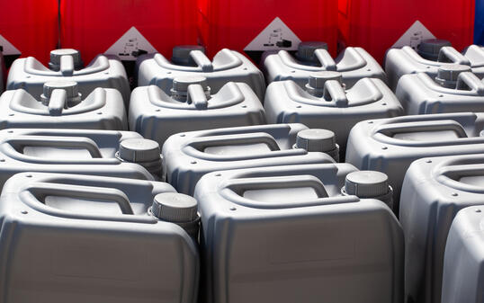plastic canisters different color in the warehouse