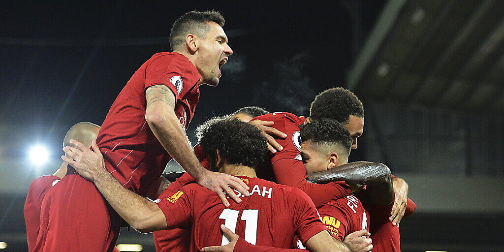 Die Liverpooler freuen sich über das 3:0 von Sadio Mané Die Liverpooler freuen sich über das 3:0 von Sadio Mané