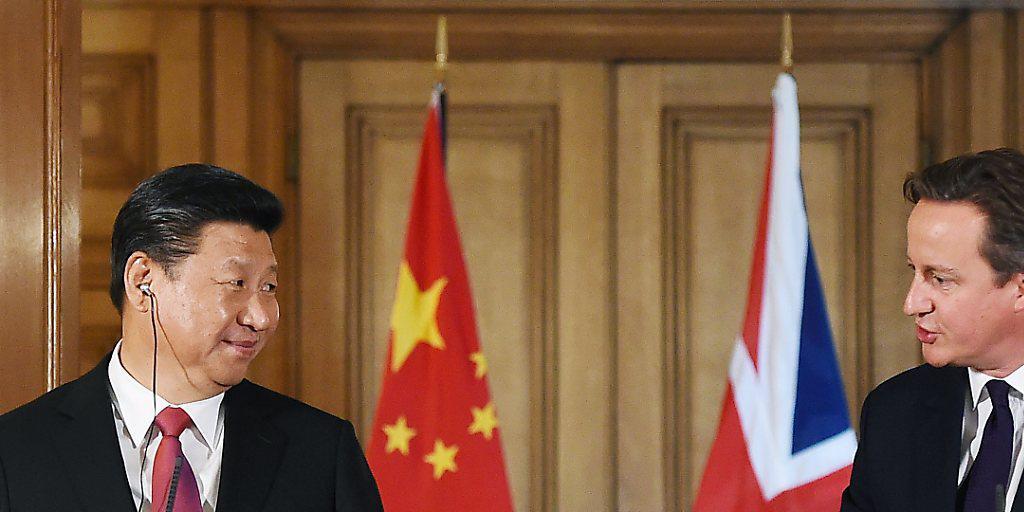 Wandel der britischen China-Politik dank Investitionen: Premier David Cameron empfängt den chinesischen Präsidenten Xi Jinping in London. (Archiv)