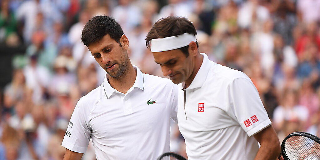 Das Spiel des Jahres: Im Wimbledonfinal verlor Roger Federer (re.) nach zwei vergebenen Matchbällen gegen Novak Djokovic. Nun kommt es, wieder in London, zur Revanche