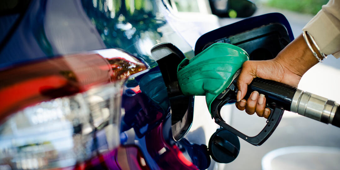 Man filling up gas in his car