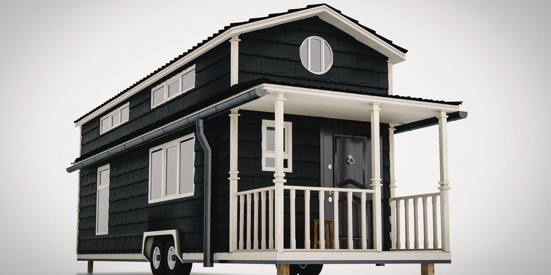 Concept of a mobile scandinavian tiny house isolated on white background. 3d rendering. Concept of a mobile scandinavian tiny house isolated on white background. 3d rendering.