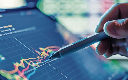 Businessman use tablet and smart phone for Stock Market