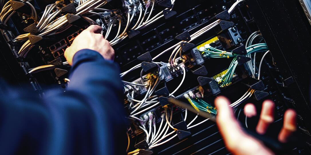 IT engineers working in server room