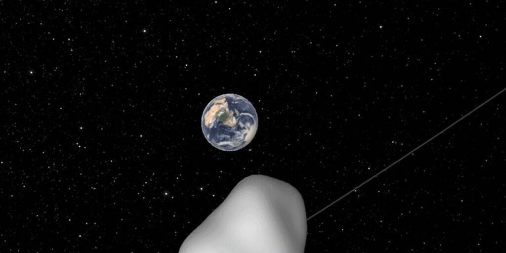Eine Illustration zeigt den Vorbeiflug des Asteroiden 2012 TC4. Ein Wiedersehen mit dem Himmelskörper wird es erst im Jahr 2079 geben.