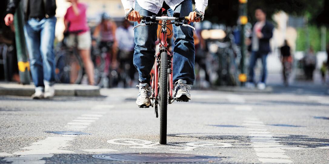 Front view of bicycle in bike lane and traffic