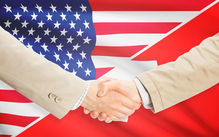 Businessmen handshake - United States and Switzerland