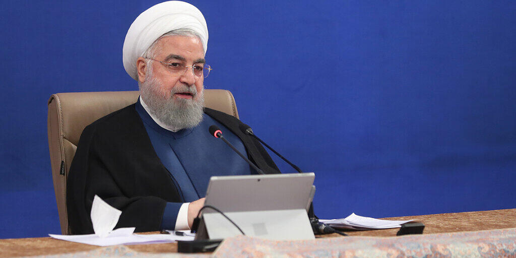 HANDOUT - Hassan Ruhani, Präsident des Iran, leitet eine Kabinettssitzung. Foto: -/Iranian Presidency/dpa - ATTENTION: editorial use only and only if the credit mentioned above is referenced in full HANDOUT - Hassan Ruhani, Präsident des Iran, leitet eine Kabinettssitzung. Foto: -/Iranian Presidency/dpa - ATTENTION: editorial use only and only if the credit mentioned above is referenced in full