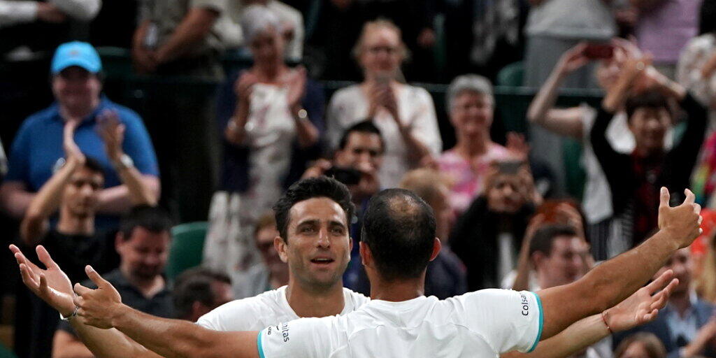 Die Erlösung nach einem epischen Final: Juan Sebastian Cabal (re.) und Robert Farah jubeln in Wimbledon über ihren ersten Grand-Slam-Titel