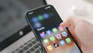 A man's hand holds a Iphone 13 Pro max