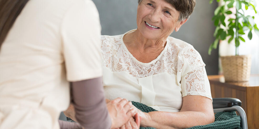 Smiling old lady and nurse Smiling old lady and nurse