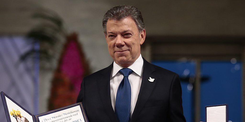 In seiner Dankesrede sagte Santos, das kolumbianische Volk mache "mit Unterstützung unserer Freunde aus aller Welt das Unmögliche möglich".