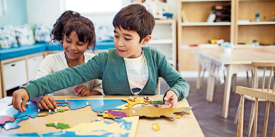 Students doing puzzle in classroom