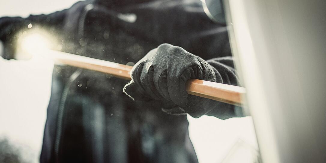 Burglar picking lock Burglar picking lock