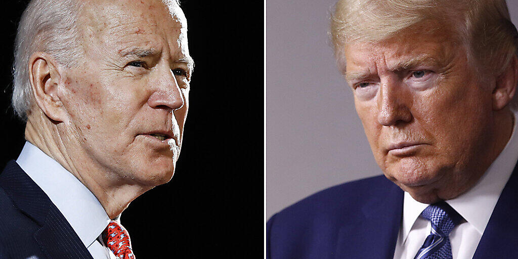 ARCHIV - Joe Biden (l) fordert im November Amtsinhaber Donald Trump heraus. Foto: Rourke/Semansky/AP/dpa