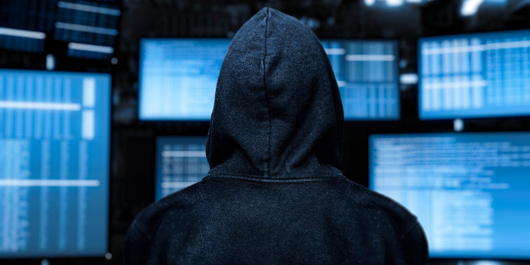 computer hacker with device screen computer hacker with device screen