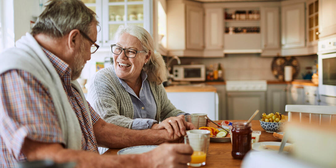 Senior couple having breakfast