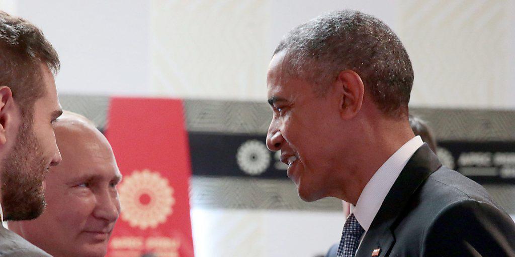 Doch noch ein Lächeln zum Schluss: Russlands Präsident Putin gibt Obama am APEC-Gipfel in Lima eine Willkommensgarantie für die Zukunft.
