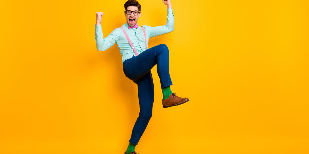 Full body photo of handsome cool clothes guy celebrate quarantine finish rise fists ready chilling party wear specs shirt suspenders bow tie trousers shoes isolated yellow color background