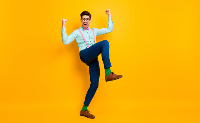 Full body photo of handsome cool clothes guy celebrate quarantine finish rise fists ready chilling party wear specs shirt suspenders bow tie trousers shoes isolated yellow color background