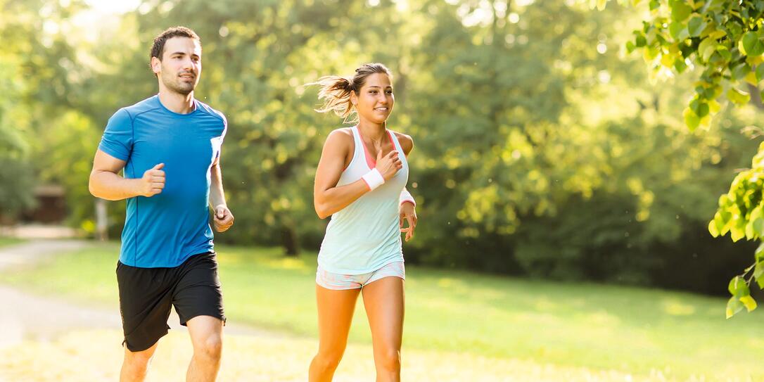 Young couple running