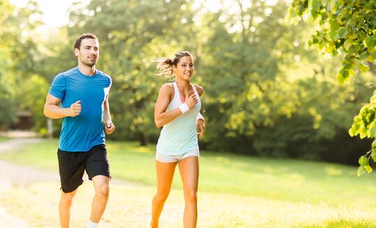 Young couple running