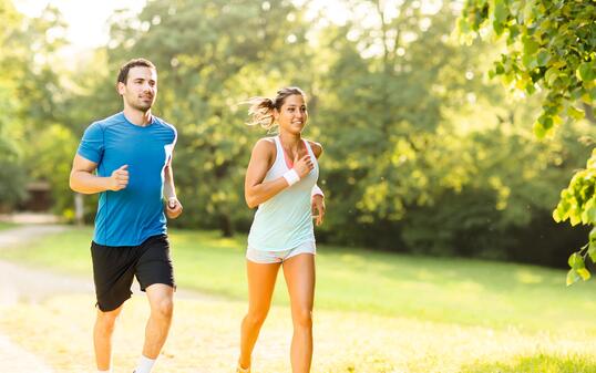 Young couple running