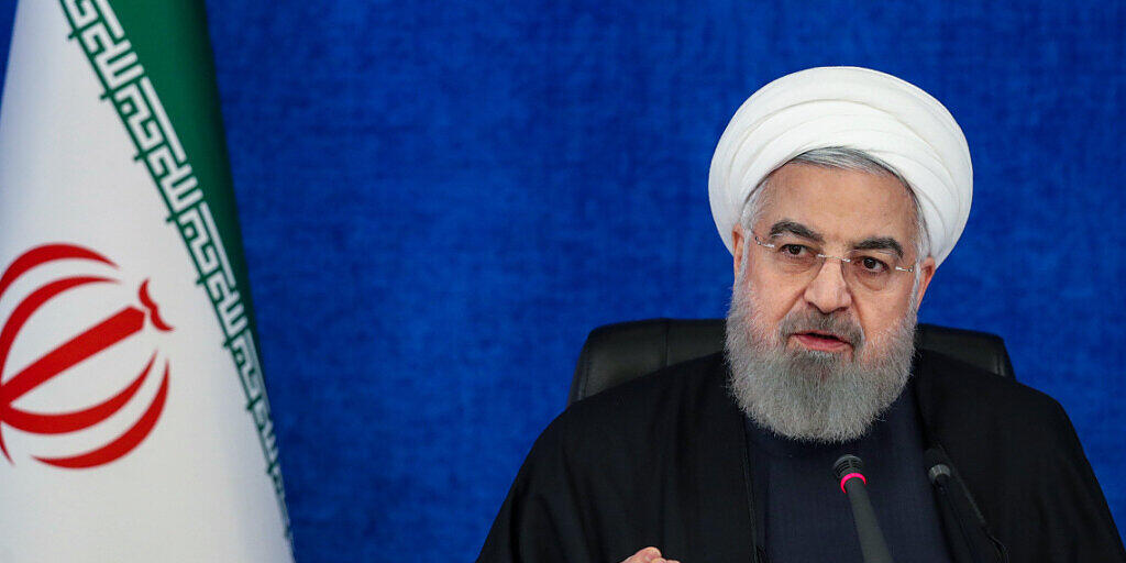 HANDOUT - Der iranische Präsident Hassan Ruhani. Foto: Ebrahim Seydi/Iranian Presidency/dpa - ACHTUNG: Nur zur redaktionellen Verwendung im Zusammenhang mit der aktuellen Berichterstattung und nur mit vollständiger Nennung des vorstehenden Credits