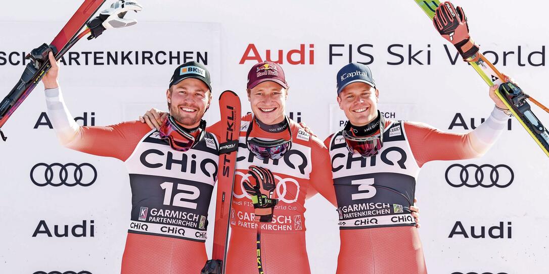 Alexis Monney (v.l.), Marco Odermatt und Stefan Rogentin feiern ihr Podest.