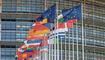 Set of European flags in front of the European Parliament