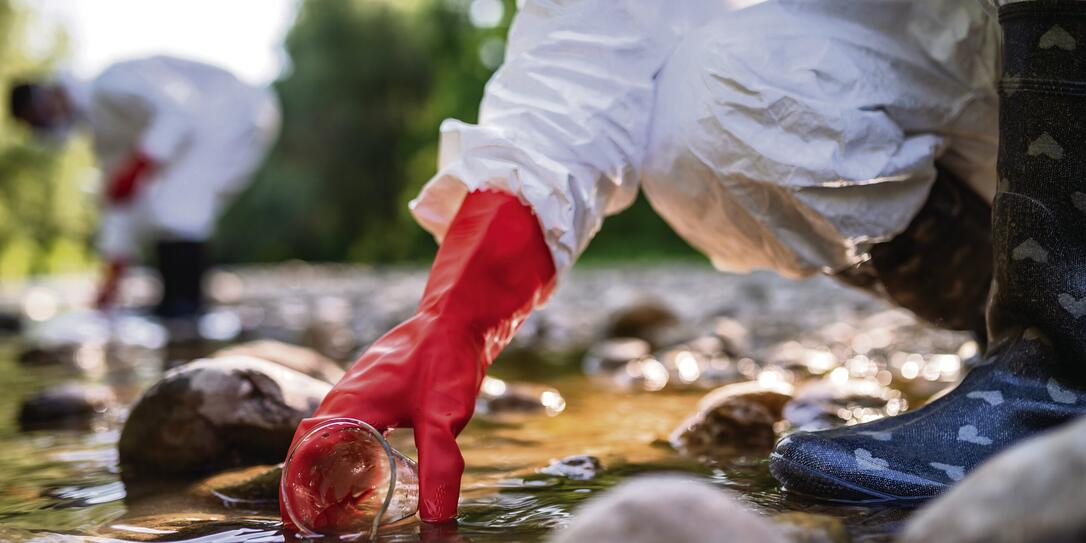 Scientist examining toxic water samples