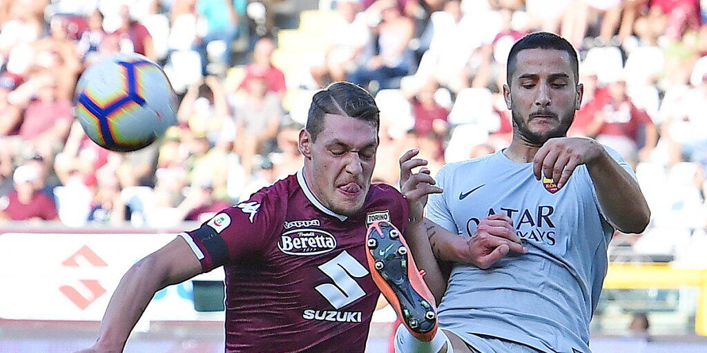 Zweikampf zwischen Romas Verteidiger Manolas (rechts) und Torino-Stürmer Belotti
