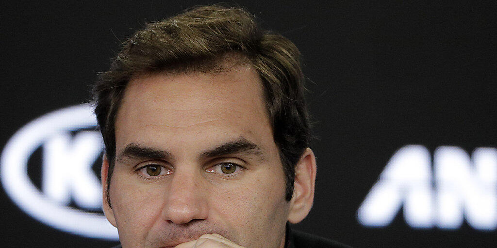 Switzerland's Roger Federer answers questions during a press conference at the Australian Open tennis championships in Melbourne, Australia, Sunday, Jan. 14, 2018. (AP Photo/Dita Alangkara)