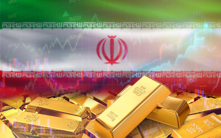 Gold bars on Iran flag in background. Gold bars stacked on Iranian flag. Concept of Iran gold reserves