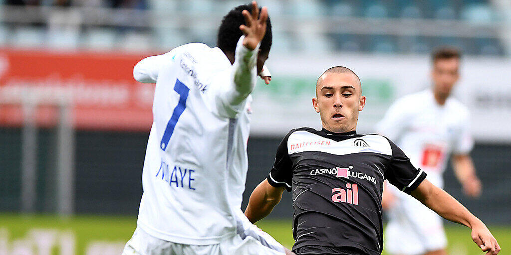 Luganos Nicola Dalmonte (rechts) gegen Ibrahima Ndiaye