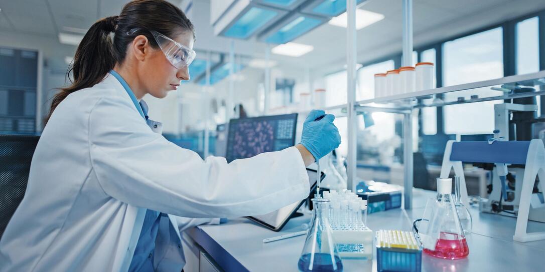 Modern Medical Research Laboratory: Female Scientist Working with Micro Pipette, Analysing Biochemicals Samples. Advanced Scientific Lab for Medicine, Microbiology Development.