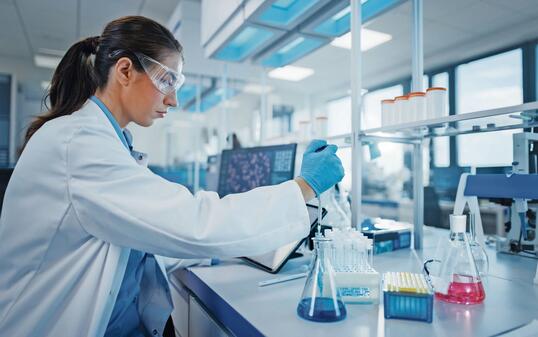 Modern Medical Research Laboratory: Female Scientist Working with Micro Pipette, Analysing Biochemicals Samples. Advanced Scientific Lab for Medicine, Microbiology Development.