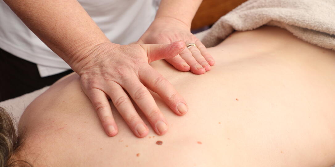 Acupuncture massage session on the back