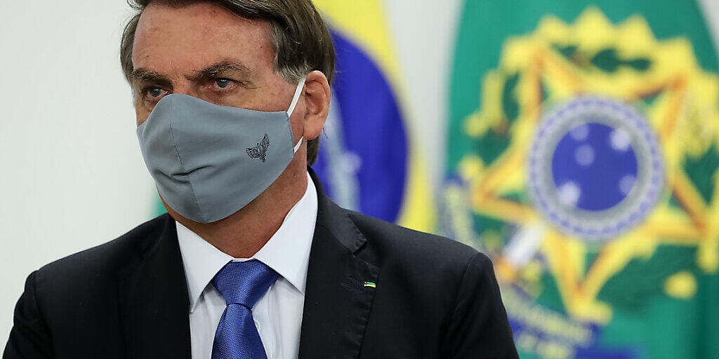 HANDOUT - Der brasilianische Präsident Jair Bolsonaro hat sich mit dem Coronavirus infiziert. Foto: Marcos Correa/Palacio Planalto/dpa - ACHTUNG: Nur zur redaktionellen Verwendung und nur mit vollständiger Nennung des vorstehenden Credits