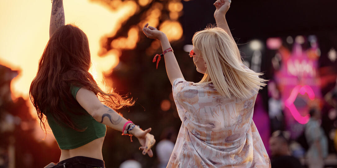Dancing on a music festival at sunset!