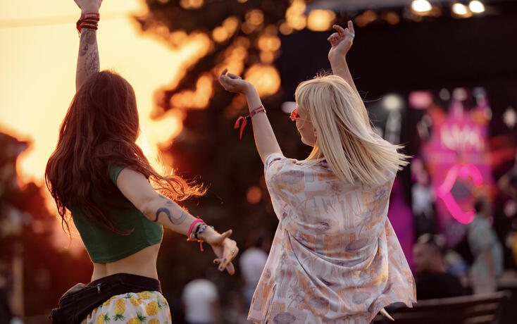Dancing on a music festival at sunset!