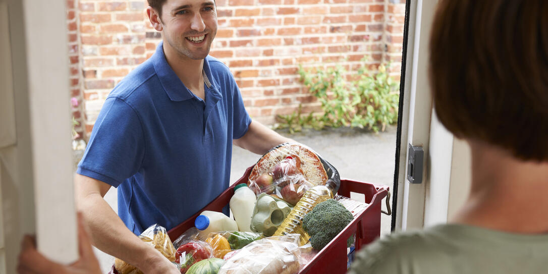 Driver Delivering Online Grocery Shopping Order