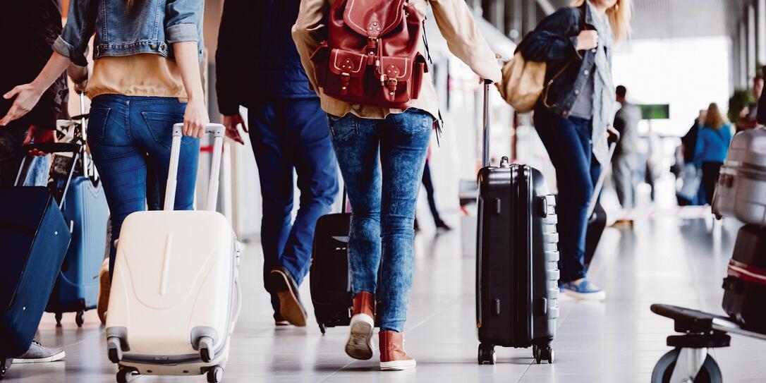 Passengers walking in the airport terminal