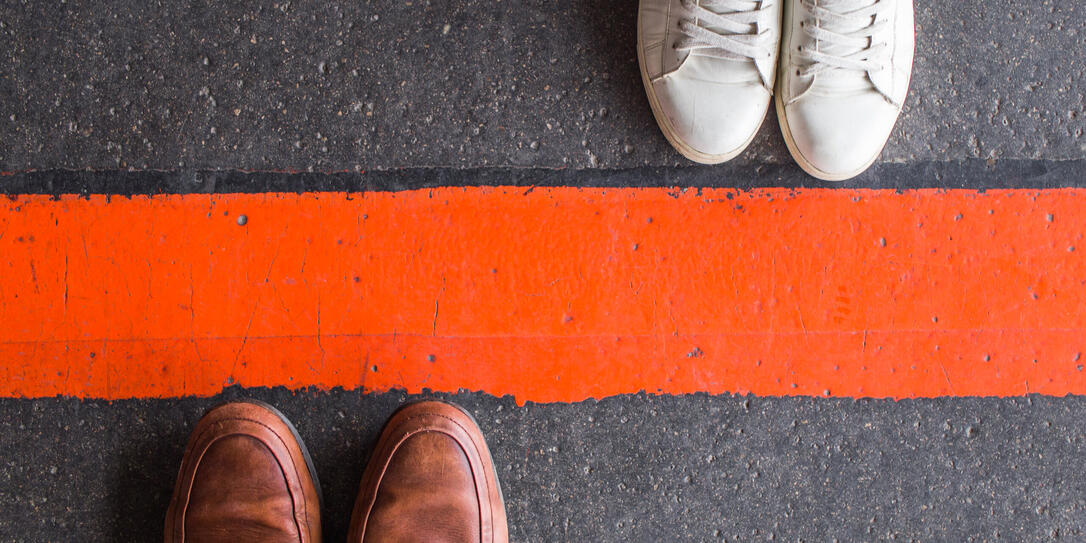 Man and woman divided by a line