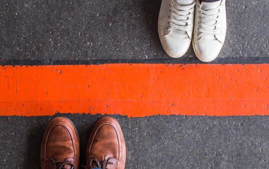 Man and woman divided by a line