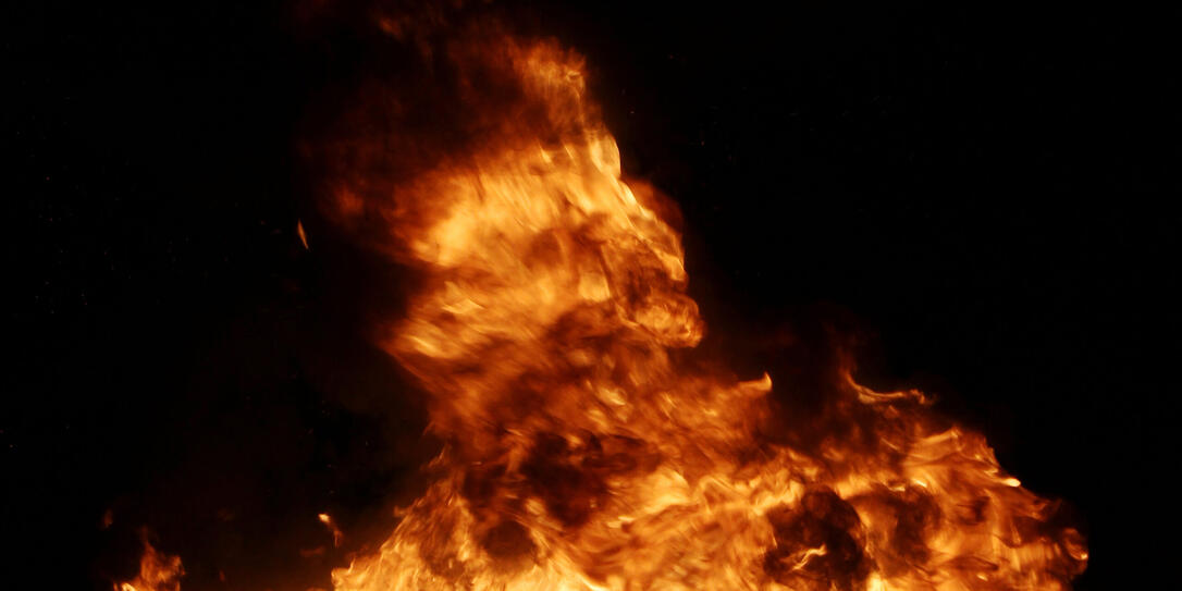 Burning tires creating big black smoke and pollution.