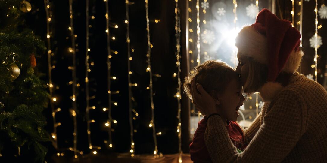 Mother and son enjoy in Christmas night